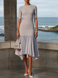Robe midi sirène grise en maille asymétrique avec col rond et manches mi-longues
