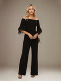 Combinaison/pantalon mère de la mariée noire en mousseline épaules dénudées manches 1/2