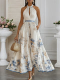 Vestido longo evasê de chiffon branco floral plissado, decote halter e sem mangas