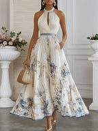 Vestido longo evasê de chiffon branco floral plissado, decote halter e sem mangas