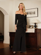 Vestido de madre de la novia negro de gasa, escote off the shoulder, mangas 3/4 y largo hasta el tobillo