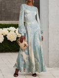 Vestido maxi línea A de gasa azul claro con estampado paisley, cuello redondo, mangas largas globo