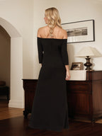 Vestido de madre de la novia negro de gasa, escote off the shoulder, mangas 3/4 y largo hasta el tobillo