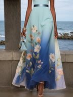 Abito midi azzurro chiaro in chiffon floreale con scollo a V, senza maniche e linea A