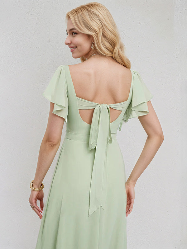 Vestido de dama de honor largo de gasa celadón, línea A, escote en V, mangas cortas y con volantes