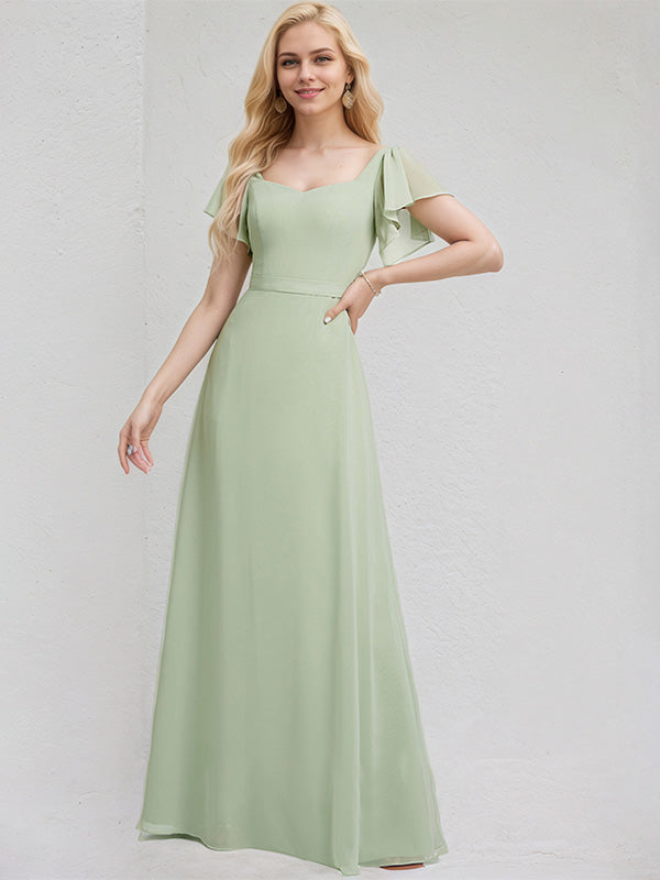 Vestido de dama de honor largo de gasa celadón, línea A, escote en V, mangas cortas y con volantes