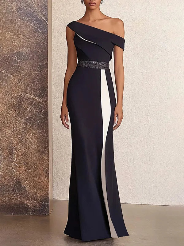 Vestido formal maxi bicolor negro y blanco con hombros descubiertos