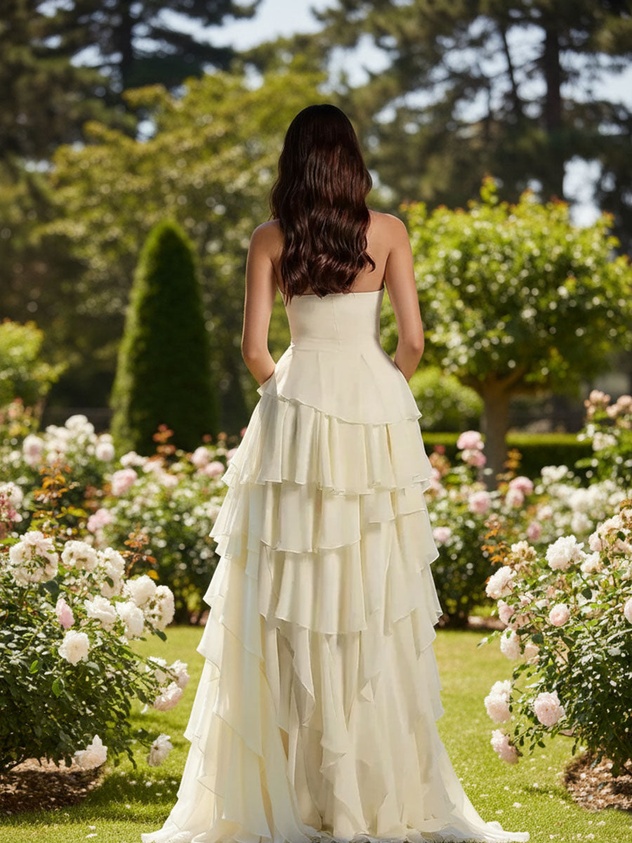 Vestido elegante de dama de honor sin tirantes, sin mangas, con volantes y capas