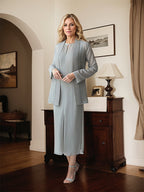 Robe mère de la mariée grise en mousseline longueur thé avec veste pailletée