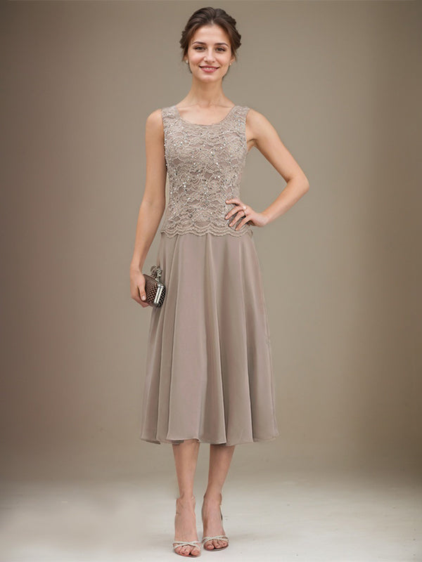 Vestido de mãe da noiva evasê, comprimento tea-length, em renda e chiffon com decote redondo e lantejoulas