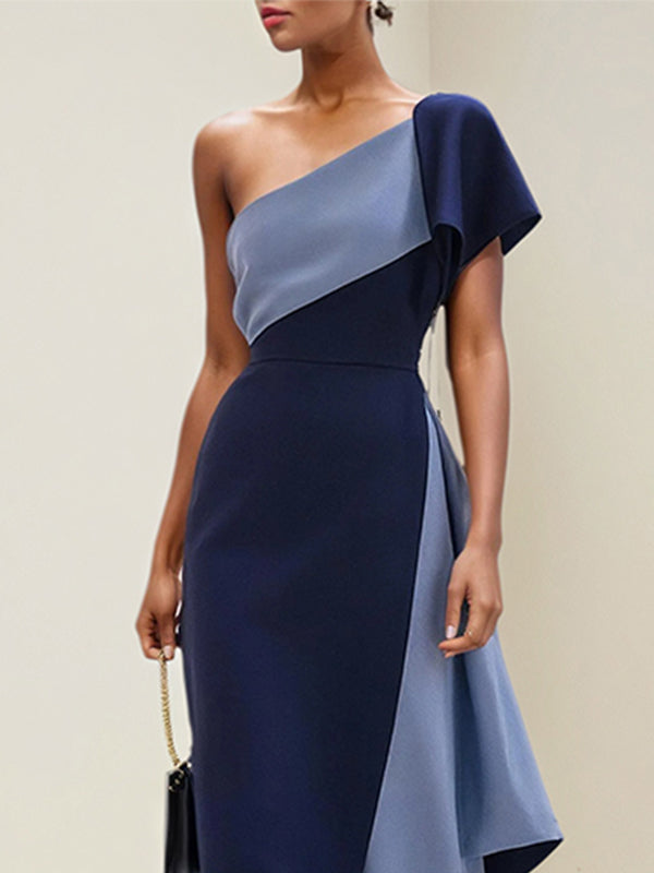 Vestido azul royal e azul aço em crepe stretch, um ombro só, mangas curtas, comprimento até o tornozelo