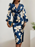 Vestido midi de satén azul floral con escote en V y mangas globo