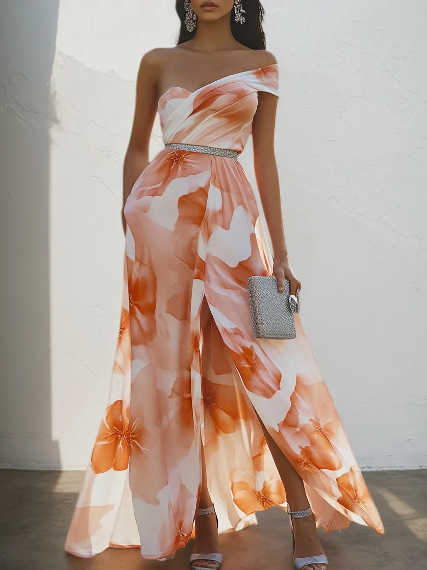 Vestido maxi de gasa naranja multicolor con flores, pedrería, abertura, un solo hombro y sin mangas en línea A
