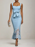 Vestido maxi sirena azul claro con lazo, encaje y escote corazón