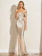 Abito formale plissettato color champagne a sirena con paillettes e spalle scoperte scintillanti