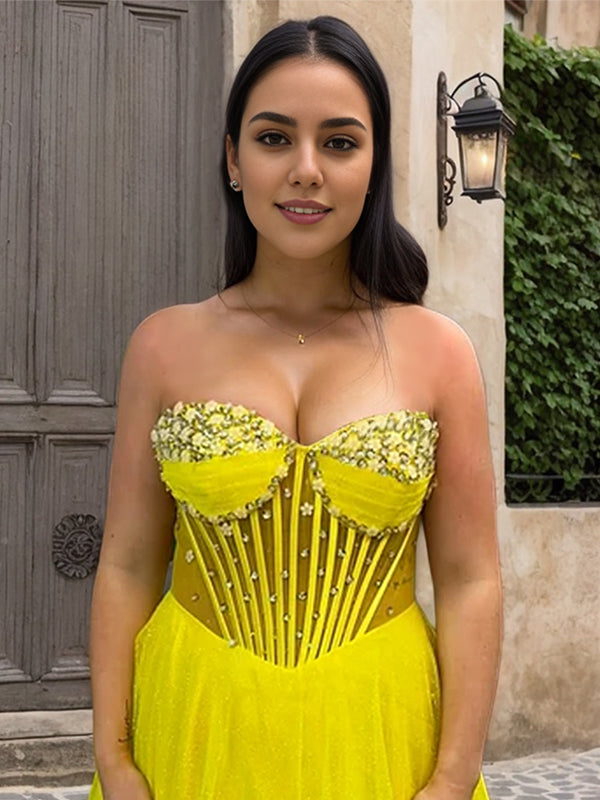 Robe de bal longue jaune ligne A avec corset et décolleté cœur