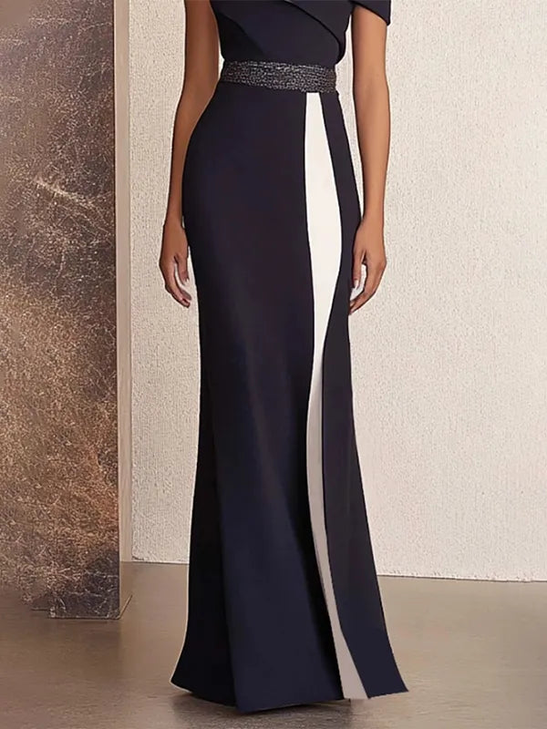 Vestido formal maxi bicolor negro y blanco con hombros descubiertos