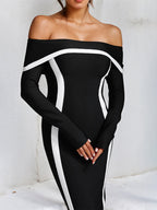Vestido negro de crepé elástico con mangas largas y escote off the shoulder hasta el tobillo