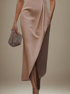 Vestido para convidada de casamento com decote redondo, sem mangas, comprimento assimétrico e bolso