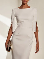 Abito midi bianco con perle finte, classico, scollo tondo, maniche a mezza lunghezza, modello aderente