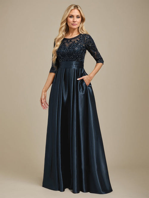 Robe mère de la mariée en satin stretch avec jupe évasée, encolure dégagée illusion, longueur au sol, dentelle, nœud et sequins