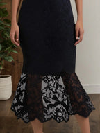 Abito da cocktail nero midi in pizzo con scollo tondo