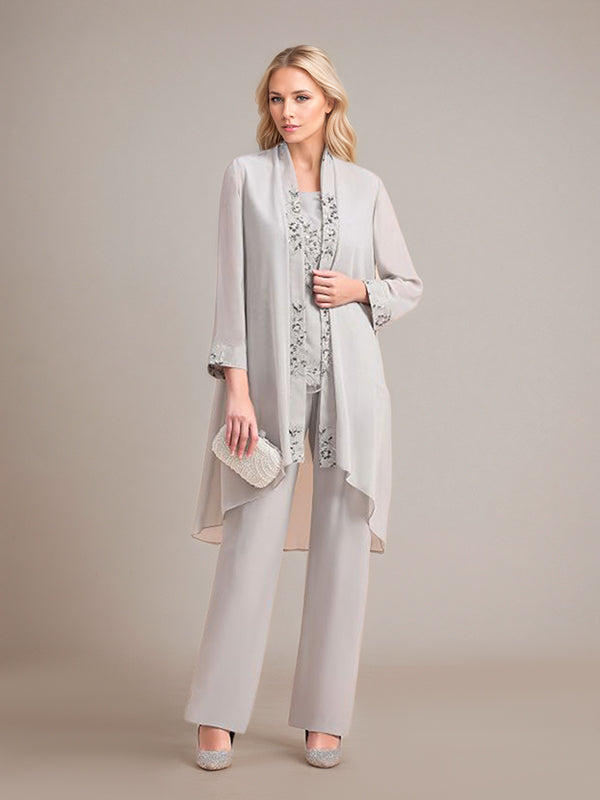 Elegante tuta argento in chiffon senza maniche con applicazioni per madre della sposa e scollo a incrocio