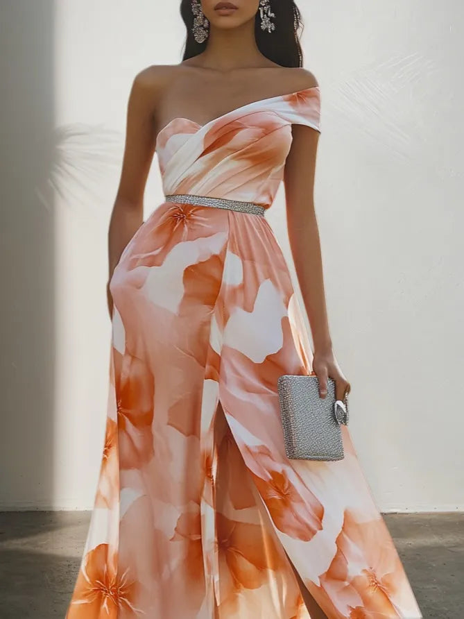 Vestido maxi de gasa naranja multicolor con flores, pedrería, abertura, un solo hombro y sin mangas en línea A