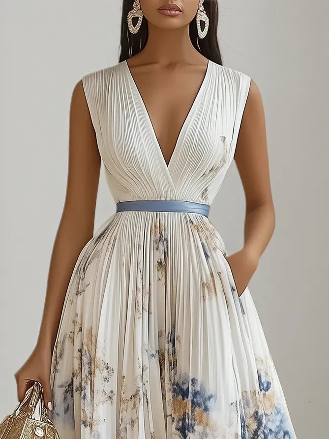 Abito midi bianco in chiffon plissettato con motivi floreali, scollo a V e senza maniche, linea a trapezio