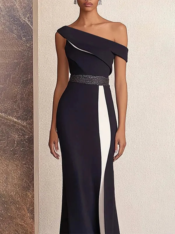 Vestido formal maxi bicolor negro y blanco con hombros descubiertos