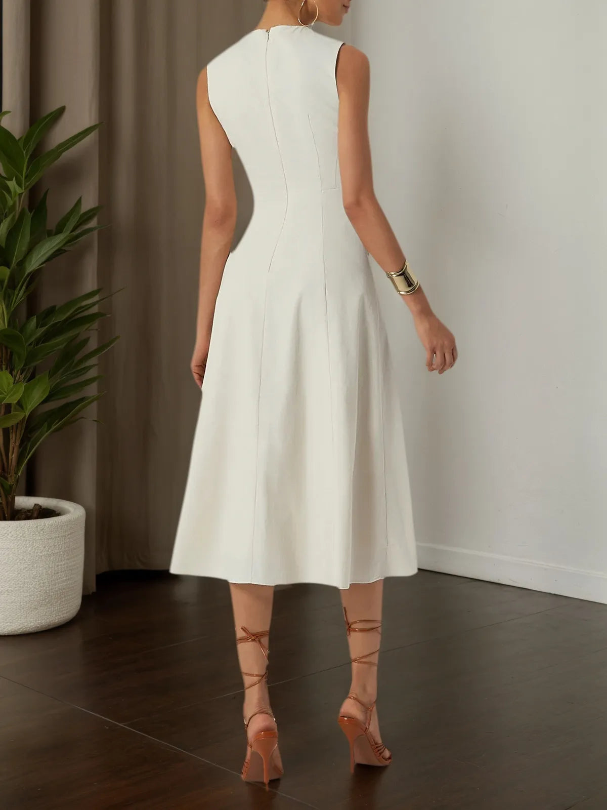 Aprikosenfarbener Lyocell-Baumwoll Midi A-Linien Kleid mit Rundhalsausschnitt und ärmellos