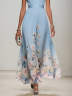 Hellblaues Blumen-Chiffon V-Ausschnitt Ärmelloses A-Linien Maxikleid