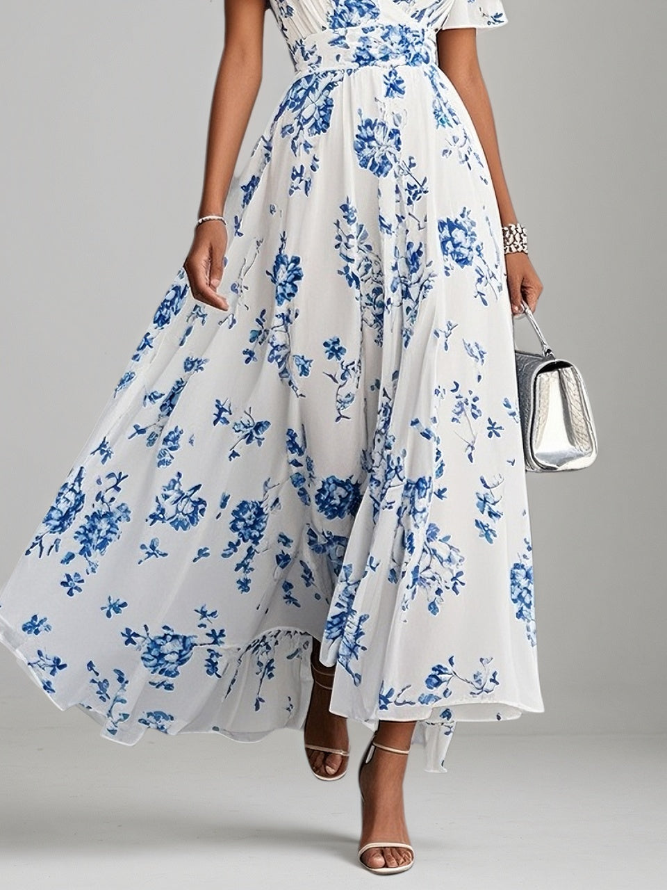 Blaues Blumen-Chiffon V-Ausschnitt kurzärmeliges A-Linien Maxikleid