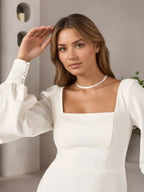 Robe de mariée blanche fourreau en crêpe stretch col carré
