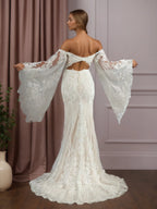 Abito da sposa sirena bianco champagne con scollo a V, paillettes e pizzo
