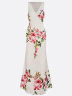 Vestido rosa com estampa floral, decote em V cruzado, sem mangas, estilo sereia