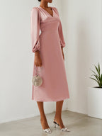 Robe midi rose à encolure en V, manches bouffantes longues, coupe trapèze
