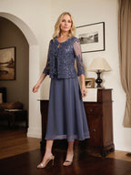 Vestido de mãe da noiva evasê, comprimento tea-length, em renda e chiffon com decote redondo e lantejoulas