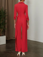 Mono de pierna ancha con blazer de solapa y aplicaciones florales rojas