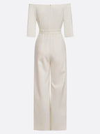 Mono blanco para mujer con escote off-shoulder y manga media elegante