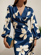 Vestido midi de satén azul floral con escote en V y mangas globo