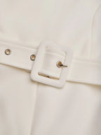 Mono blanco para mujer con escote off-shoulder y manga media elegante