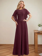 Vestido de mãe da noiva em chiffon e renda com ilusão decote redondo, em linha A, comprimento até o chão com lantejoulas