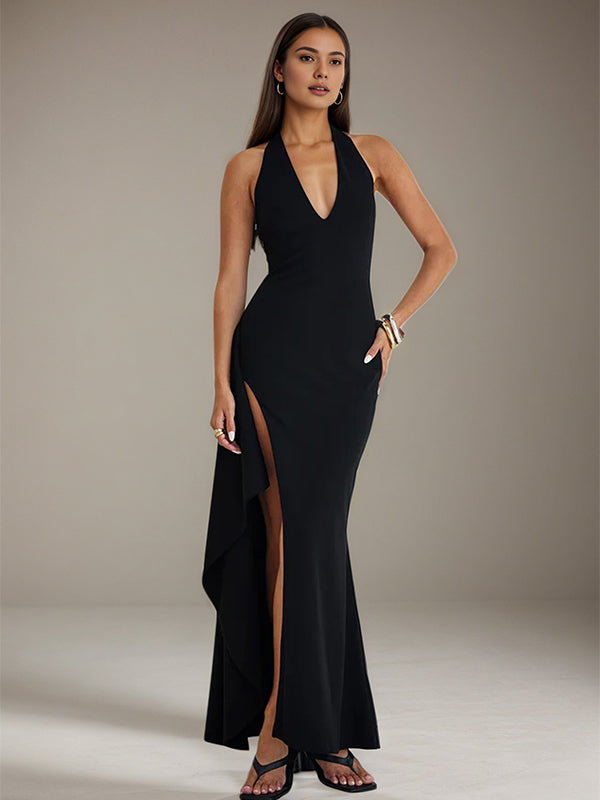 Vestido preto de crepe stretch, decote em V, sem mangas, costas abertas, com fenda alta