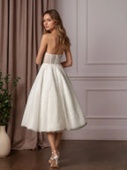 Vestido de novia blanco en línea A sin tirantes con cuentas