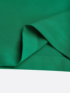 Tuta elegante verde da donna con scollo a cappuccio arricciato e senza maniche
