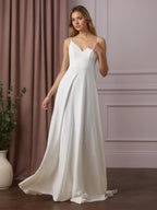 Robe de mariée blanche en crêpe stretch à sequins, coupe trapèze, col en V