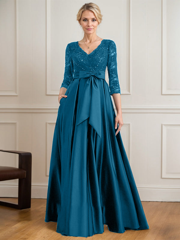 Robe mère de la mariée en satin et dentelle, coupe trapèze, col en V, longue avec nœud à sequins
