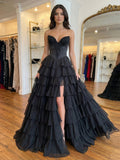 Robe de bal en satin noir avec dentelle, appliques, corset et fente