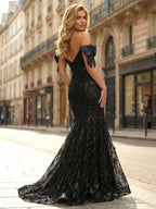 Vestido de fiesta de graduación sirena negro con lentejuelas, escote corazón y detalles románticos de lazo